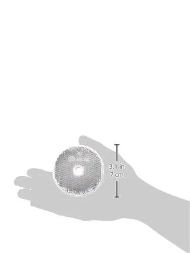 Person holding RF20 Photoelectric Sensor Reflector, 2 inch diameter, used for through beam or retroreflective industrial automation detection.
