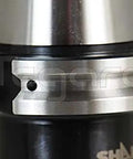 Close-up of CAT40 ER32 3.0 Inch Collet Chuck Kit, 4 Piece Tool Holder, showcasing black and silver construction.