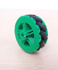 3D-printed mecanum omni wheel, green plastic hub with black rubber rollers, 64mm diameter