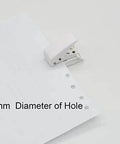 White handheld tool punching holes in paper, Two Pack Small Black And White One Quarter Inch Circle Hole Punch Handheld Tool
