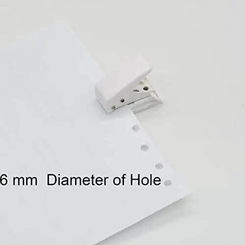 White handheld tool punching holes in paper, Two Pack Small Black And White One Quarter Inch Circle Hole Punch Handheld Tool