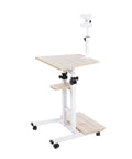 Top Shelf Height Adjustable Standing Laptop Desk With Smooth Roll Wheels Ergonomic Sit Stand Work Cart For Your Chill Home Office Bedroom Or Living Room Natural Wood Portable Mobile Desk, featuring white frame and natural wood top.