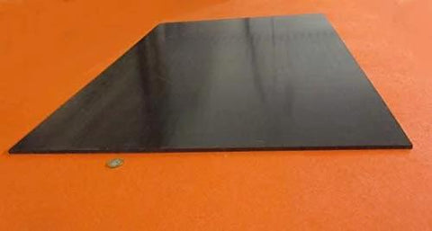 UHMW PE Black Sheet 1/4 Inch Thick 24 By 36 Inches Built To Last Durable Wear Resistant Plastic Panel, side view on orange surface.