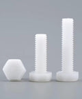Badass PTFE Plastic Hex Cap Screws Five Pack Featuring M8 Precision Cut Bolts, showing different sizes and shapes of white hex bolts.