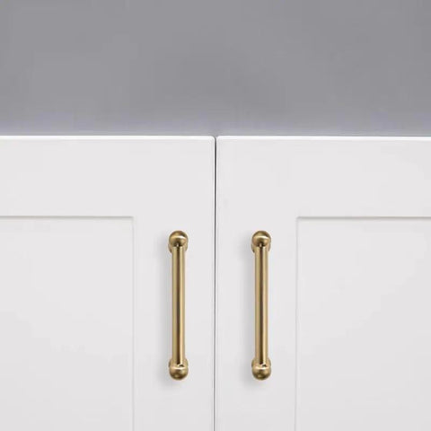 Premium Solid Brushed Brass Cabinet Pulls And Drawer Handles 3 Inch Hole Center on white cabinet doors.