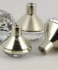 Slick Modern Diamond Cut Crystal Glass Cabinet Handles And Drawer Knobs For Kitchen Cupboards showing four 25mm wide faceted crystal pulls.