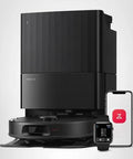 roborock Qrevo robot vacuum and mop with black docking station; smartphone and smartwatch visible.