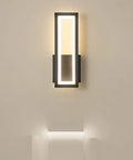 Sleek Rectangular LED Wall Sconce Delivering Flat Out Stunning Three Tone Lighting And Smooth Acrylic Glow To Elevate Any Hallway Bedroom Corner With Zero Effort Chic Vibes mounted on a light wall.