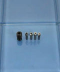 Quick Change Collet Nut Kit Set 4485 Built Tough for Dremel and Compatible Rotary Tools displayed on blue surface