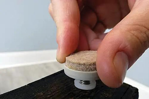 Adjusting 4 Pack 1 Inch Threaded Felt Furniture Glide With One Quarter Inch Adjustable Leveling Feet on dark wood surface