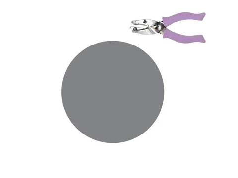 Image of Purple Circle Hand Punch 1/4 Inch For Crafts With Cushioned Grip, shown next to a punched circle, durable craft tool.