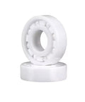 Full Ceramic Bearing ABEC-9 Precision ZrO2 Zirconia Deep Groove Ball Bearing 5x10x4 Millimeters stacked for fishing reels.