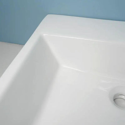 Close-up view of the USZWBY Vessel Sinks Bathroom Vessel Sink Simple Ceramic Above-Ground Basin with smooth edges.