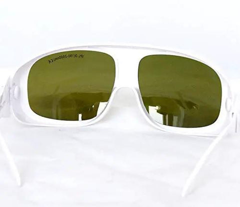 Game Changing Heavy Duty Ipl Safety Glasses And Laser Protection Goggles For Beauty Products Block Harmful Uv And Infrared Rays Up To 2000Nm With Od 4 Plus Filtration Slick Coated Lenses Rock Solid Frame Built Tough For Studio Pros, front view with green lenses.