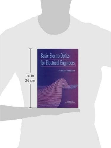 Book: Basic Electro Optics for Electrical Engineers, front view; purple-blue cover; 10-inch ruler beside.