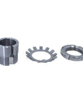 Front view of a three-piece metal adapter sleeve kit: threaded sleeve, toothed washer, and threaded nut