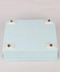 Four Pack Self Adhesive Directional Caster Wheels For Kitchen Cabinets Drawer Units And Storage Bins Hella Smooth Ball Bearings attached to a blue storage box.