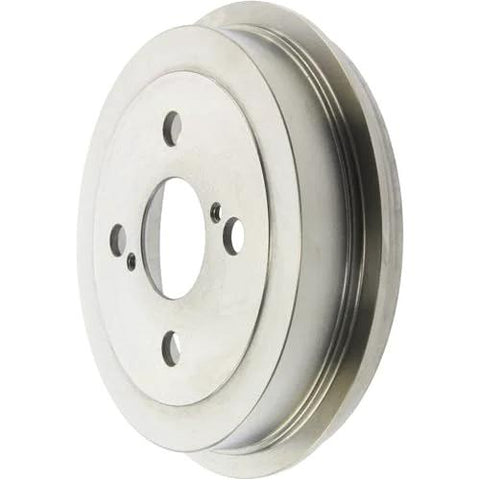 Front view of silver metal rear brake drum with central bore and four mounting holes