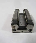 Front view of 15 mm runner block with pulley and bushing, single linear slide unit R162211420, sealed ball bearing option shown