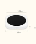 Keep Those Daily Brews Popping With This Touch Control Coffee Mug Warmer And Electric Cup Heater features a square design with a black surface.