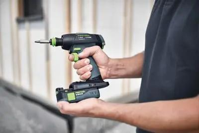 Professional 18V Cordless Drill And Driver Tool With Quick Change Chuck System in hand, ideal for versatile wood and metal work.