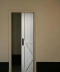 Matte Black Barn Door Handle Set For Sliding Doors, Ultra Thin.02 Inch Backplate installed on white sliding barn door in modern interior.