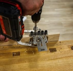 Weekend Hobbyist Stainless Dowelling Jig Kit With One Quarter Inch, Three Eighth Inch, And One Half Inch Holes in use by DIYer