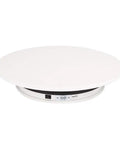 360 Degree Automatic Rotating Display Stand Electric Turntable Revolving Platform For Showcasing Watches Jewelry And Small Items white ABS plastic base with simple design.