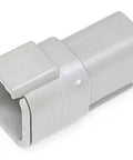 Real Deal Heavy Duty Automotive DTM Connector Pack Of Five Hundred Featuring Six Ports Contact Size Twenty Fits Sixteen Through Twenty Two Gauge Wiring Demands WM 6P Wedgelocks Built Tough gray plastic connector showing its six-port housing.