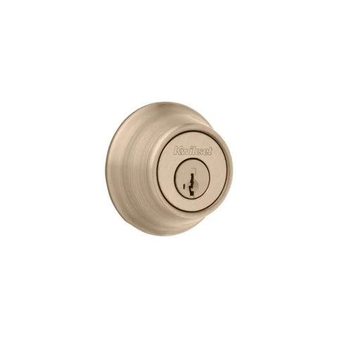 Close-up of Pick Resistant SmartKey Rekey Deadbolt For Exterior Doors in Antique Brass finish, featuring a round keyed entry.