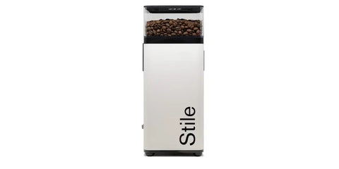 Heavy Duty Automatic Espresso Coffee Grinder White With Dual Programmable Dosing Rings Micro Burr Precision Plus Slick Touchscreen Panel For No Hassle Barista Level Brews Smooth Operation Verified front view with coffee beans.