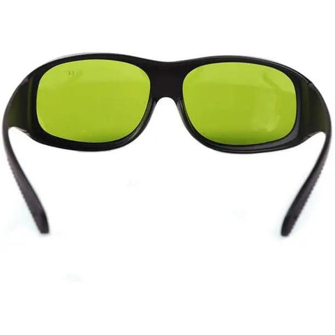 Top Shelf Laser Safety Glasses Lock Out Intense 755 808 And 1064 Nm NdYag Beams Via Thick Clear Lenses with green lenses.