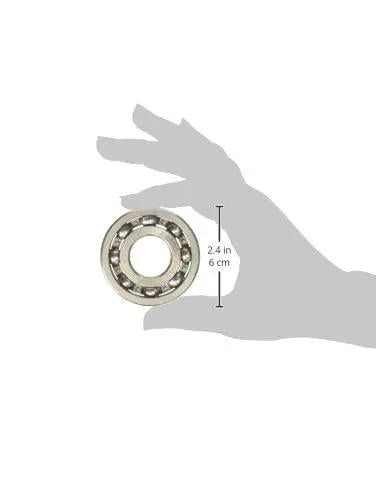 Heavy Duty Single Row Ball Bearing 305AG in a hand, showcasing its 2.4-inch size and precision industrial hardware design.