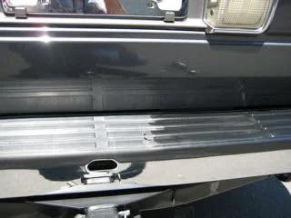 Forever Black Bumper & Trim Conditioner 32oz, rear bumper with black finish and chrome trim