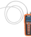 Front view of Klein Tools ET180 digital manometer, orange handheld pressure tester with dual ports and backlit LCD