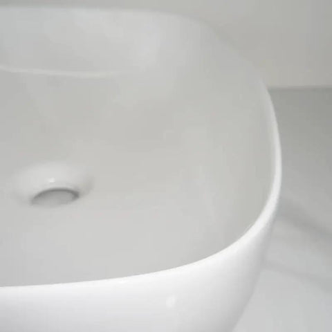 USZWBY Vessel Sinks Simple Square Rounded Corner Bathroom Ceramic Vessel Sink Large Size showing interior design and basin shape.