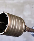 Bosch SDS-Max rotary hammer core bit, 2-5/8 in diameter x 22 in length, mounted in drill.