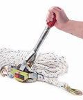 Person holding a 3/4 Ton Capacity Rope Puller With 100 Feet Of 0.6 Inch Rope Come Along Winch for heavy lifting and vehicle recovery.