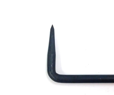 Straight Up Heavy Duty Metal Scriber Constructed From Tempered Alloy Steel For Precise Layout Work In Tricky Spots With A Knurled Handle For Sure Grip On Any Job Site close-up of scribing tool tip with a sharp point.