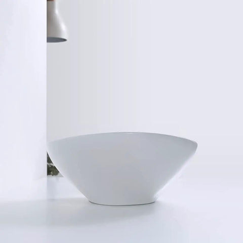 Oval Vessel Sink For Bathroom Above Counter Ceramic Art Basin In Canoe Shape 16 By 13 Inches No Overflow Hole No Faucet Holes Five And A Half Inch Depth Super Sleek And Easy To Install And Clean, side view, white ceramic.