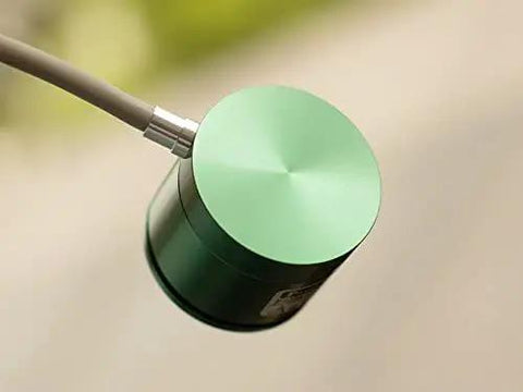 Compact Hall Effect Absolute Rotary Encoder Sensor with 180 Degree Range, 12-Bit Resolution, 0-5V Output, 6mm Shaft, green casing, side view