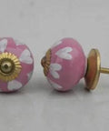 Sweet One Hundred Piece White Ceramic Heart Drawer Knobs For Cabinet Furniture Handles And Dresser Pulls With Totally Smooth Corners And Hella Sturdy Rust Free Design Ready To Upgrade Your Dope Home Decor Setup, featuring pink heart designs.