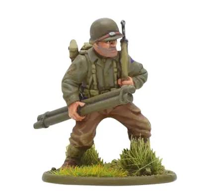 US Rangers 28mm plastic miniature holding a bazooka on grassy base for World War II tabletop wargaming figure set
