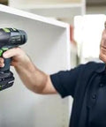 Professional 18V Cordless Drill And Driver Tool With Quick Change Chuck System used for installing shelves with precision.