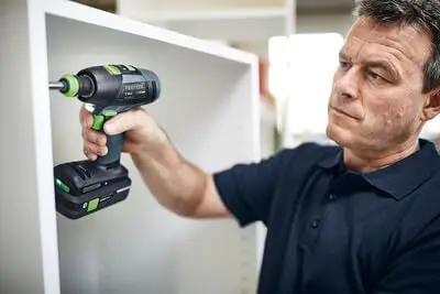 Professional 18V Cordless Drill And Driver Tool With Quick Change Chuck System used for installing shelves with precision.