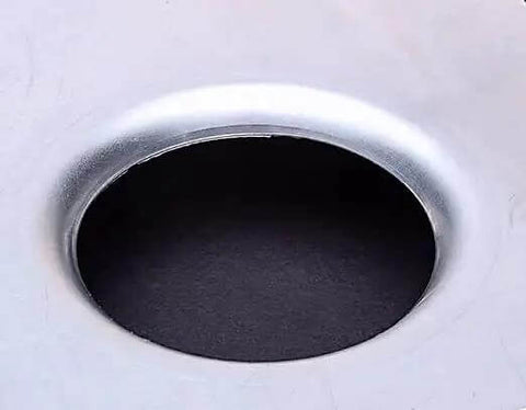 Close-up of a smooth hole created by the Heavy Duty Hole Punch And Flare Tool For Metalworking Black Finish Half Inch Dimple Plate Dies For 16 Gauge Steel