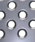 Close-up of metal sheet with dimples created by Six Piece Dimple Die Set Half Inch Through One And Three Quarter Inch Sizes, Heavy Duty SAE 8620 Steel.