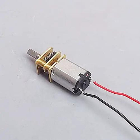 Three Mini Micro N20 Gear Motors DC 3V To 6V with full metal gearbox, showing a compact design for DIY robot projects, side view.