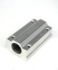 Solid Core 8mm Long Linear Slide Units Roll Smooth With Pure Ball Bearing Action Built Damn Tough For Heavy Loads And Keep Your Cnc Gear Tracking Bulletproof On Any Motion Build You Are Piecing Together, silver aluminum block with a ball bearing.