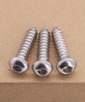 Close-up image of three Stainless Steel M6 x 50mm Button Head Socket Cap Screws on a surface, showing full thread and hex drive.